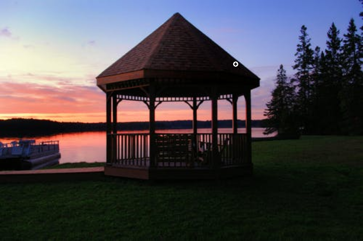 a gazebo by the lake